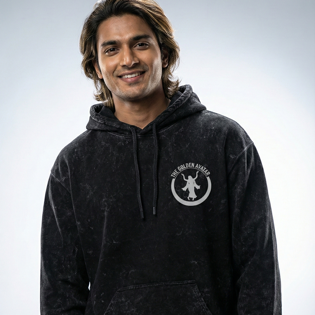 Person wearing a black hoodie with a logo on a gray background