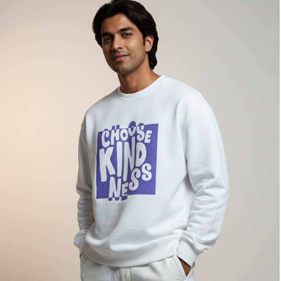 Man wearing a white sweatshirt with 'CHOOSE KINDNESS' text on a gradient background