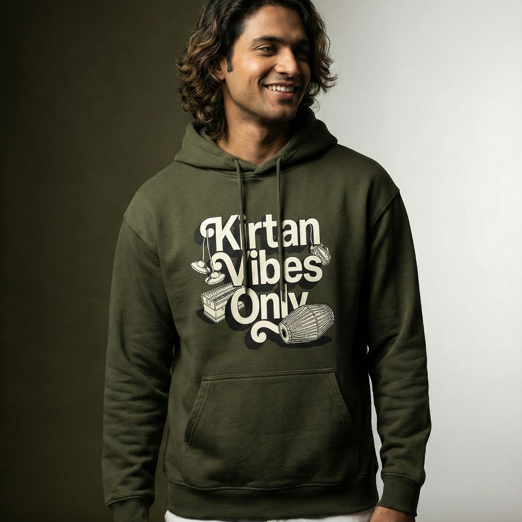 Man wearing a green hoodie with 'Kirtan Vibes Only' text against a gradient background